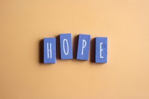 Wooden cubes with text HOPE