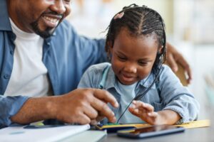 Caring of father and child learning to count together
