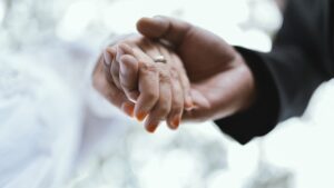Married couple holding hand
